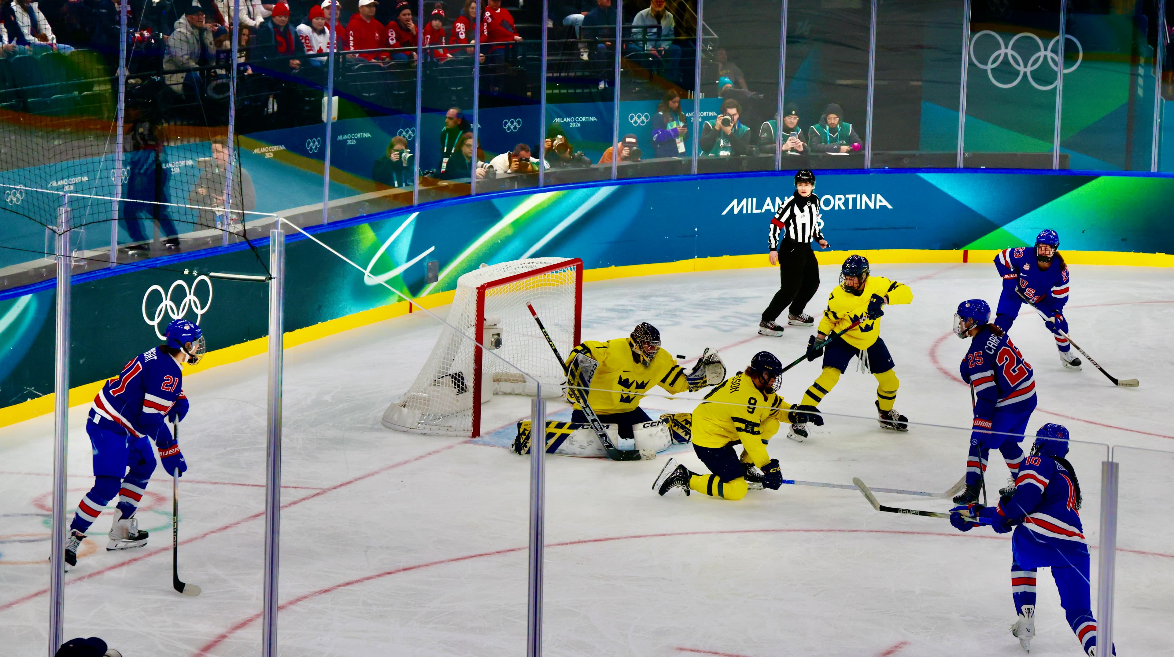 USA women's hockey player driving to the net against Sweden at Milano Cortina 2026