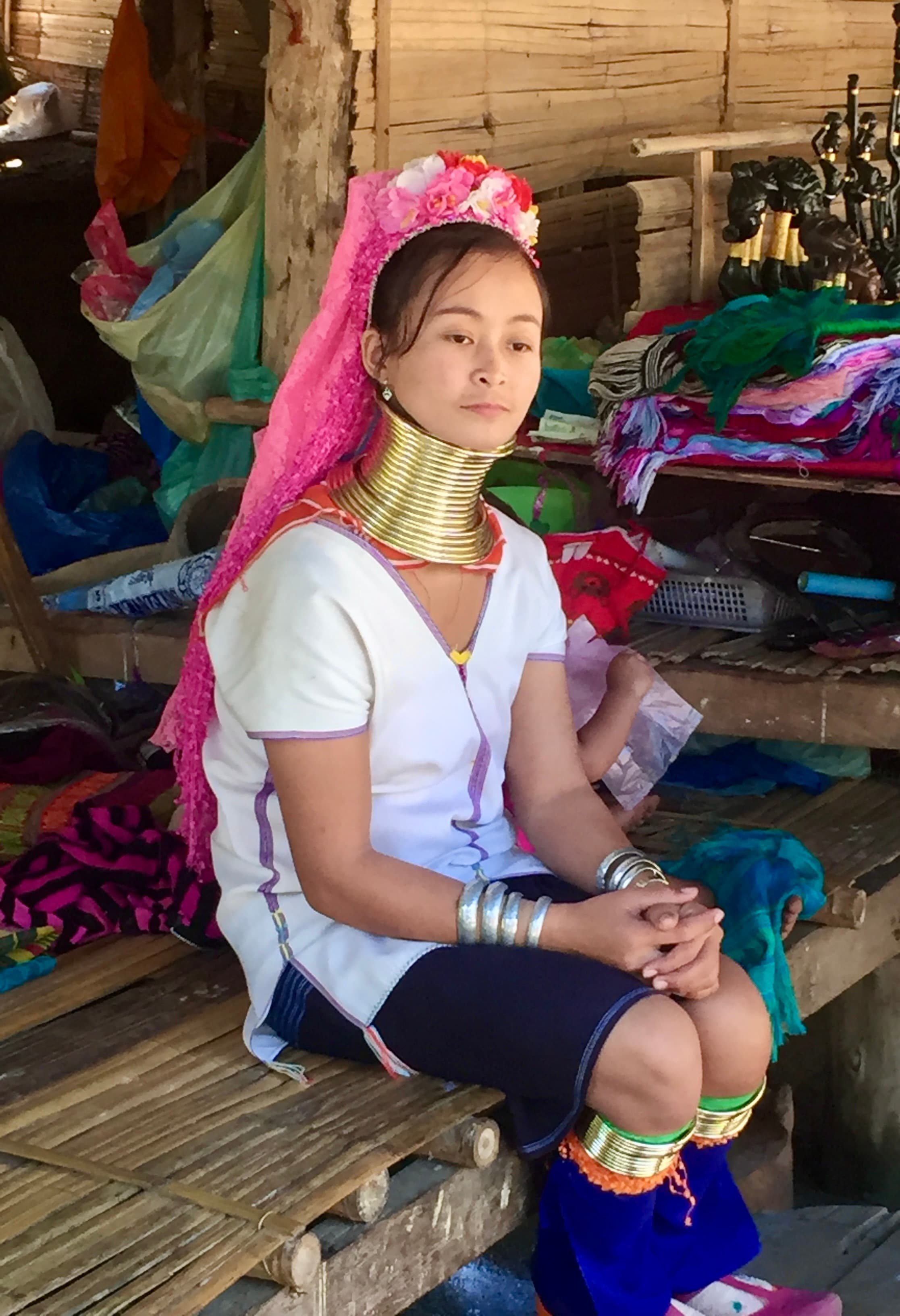 Portrait of a Kayan long-neck woman in traditional dress, northern Thailand